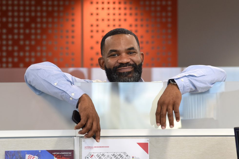 Harkins employee Rod Bell in new office.