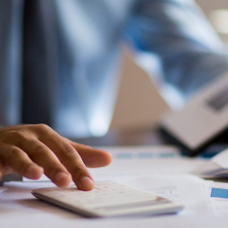 Accountant at desk working.