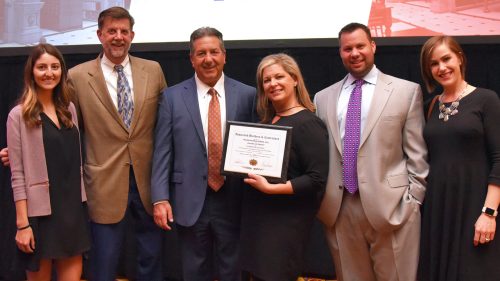Harkins receives award.
