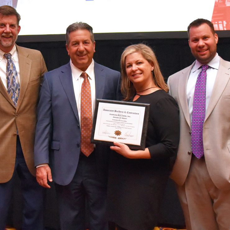 Harkins receives award.