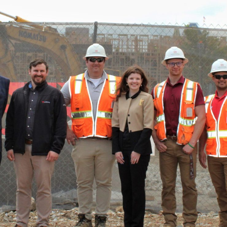 Harkins celebrates groundbreaking of Perkins Homes Phase II.