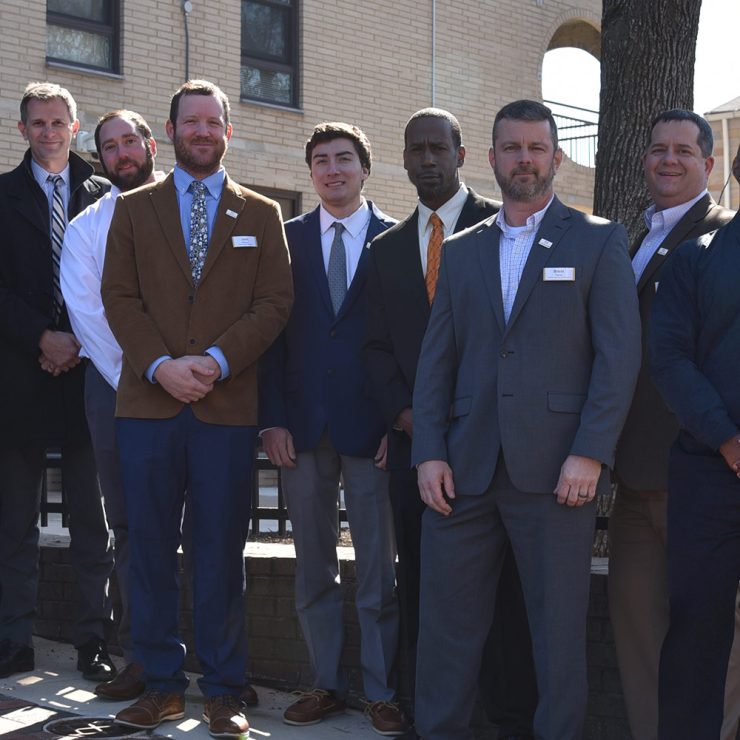 Monument East celebrates ribbon cutting.