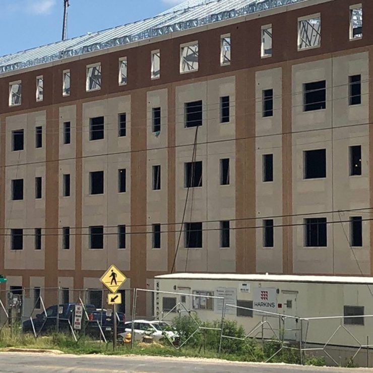 Naval Air Station Barracks Facility tops out.